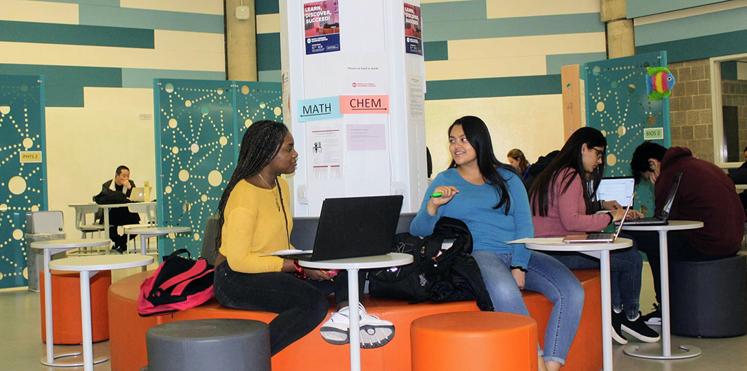 Students discussing homework in the Math and Science Learning Center