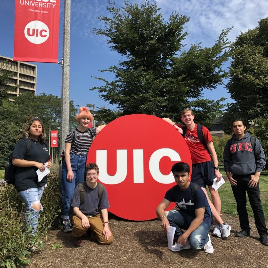 UIC students near campus logo