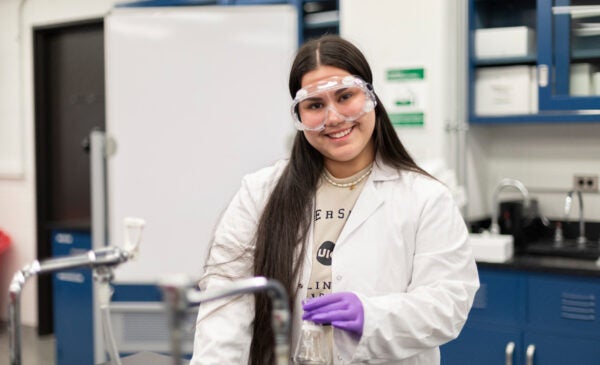 Female student working in a science lab