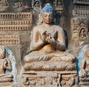 A stupa from the Mahabodhi Temple, with a seated Buddha, in Bodh Gaya, Bihar, India. David Cumming/IndiaPictures/Universal Images Group via Getty Images 