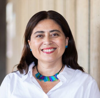 Professor Xóchitl Bada in University Hall at the University of Illinois Chicago
                  