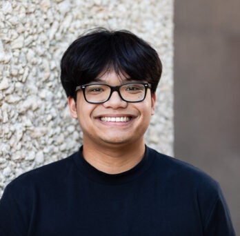 Biological Sciences student Andrew Magsombol on UIC's East campus
                  