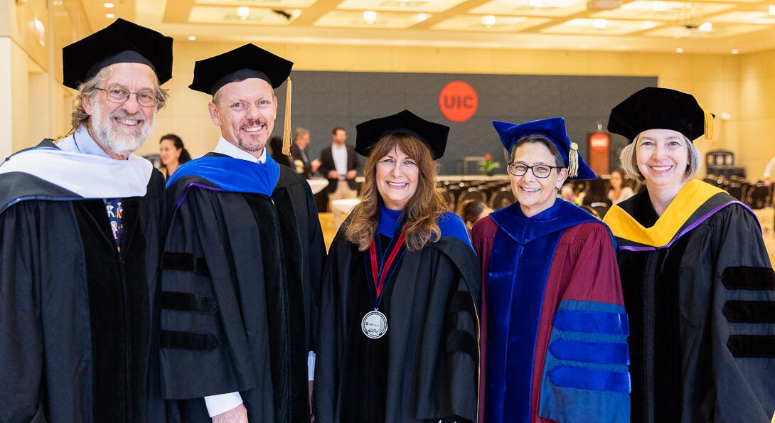 LAS Faculty and Dean stand with Kimberly Schonert-Reichl and her investiture event