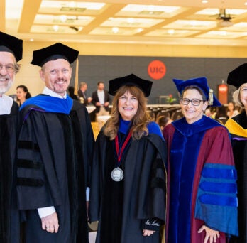 LAS Faculty and Dean stand with Kimberly Schonert-Reichl and her investiture event
                  